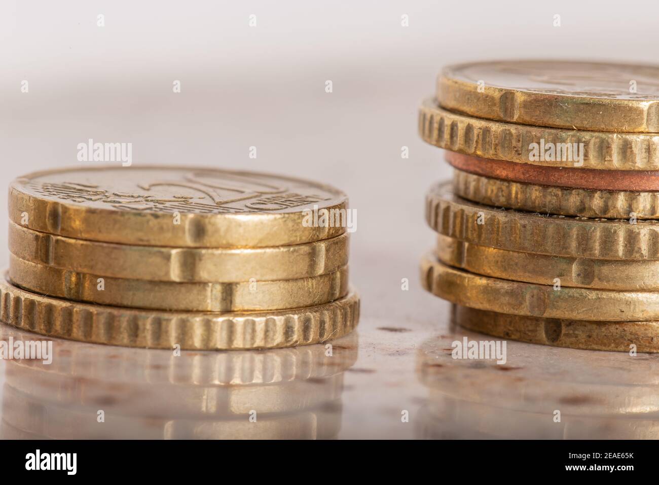 Gold coins cash money in piles, Isolated on white background Stock ...