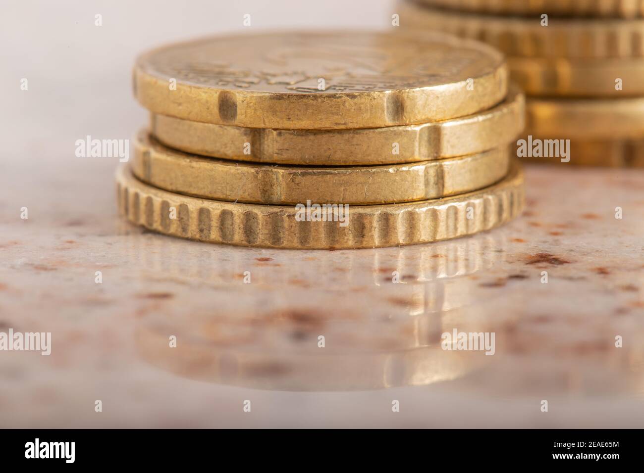 Gold coins cash money in piles, Isolated on white background Stock ...