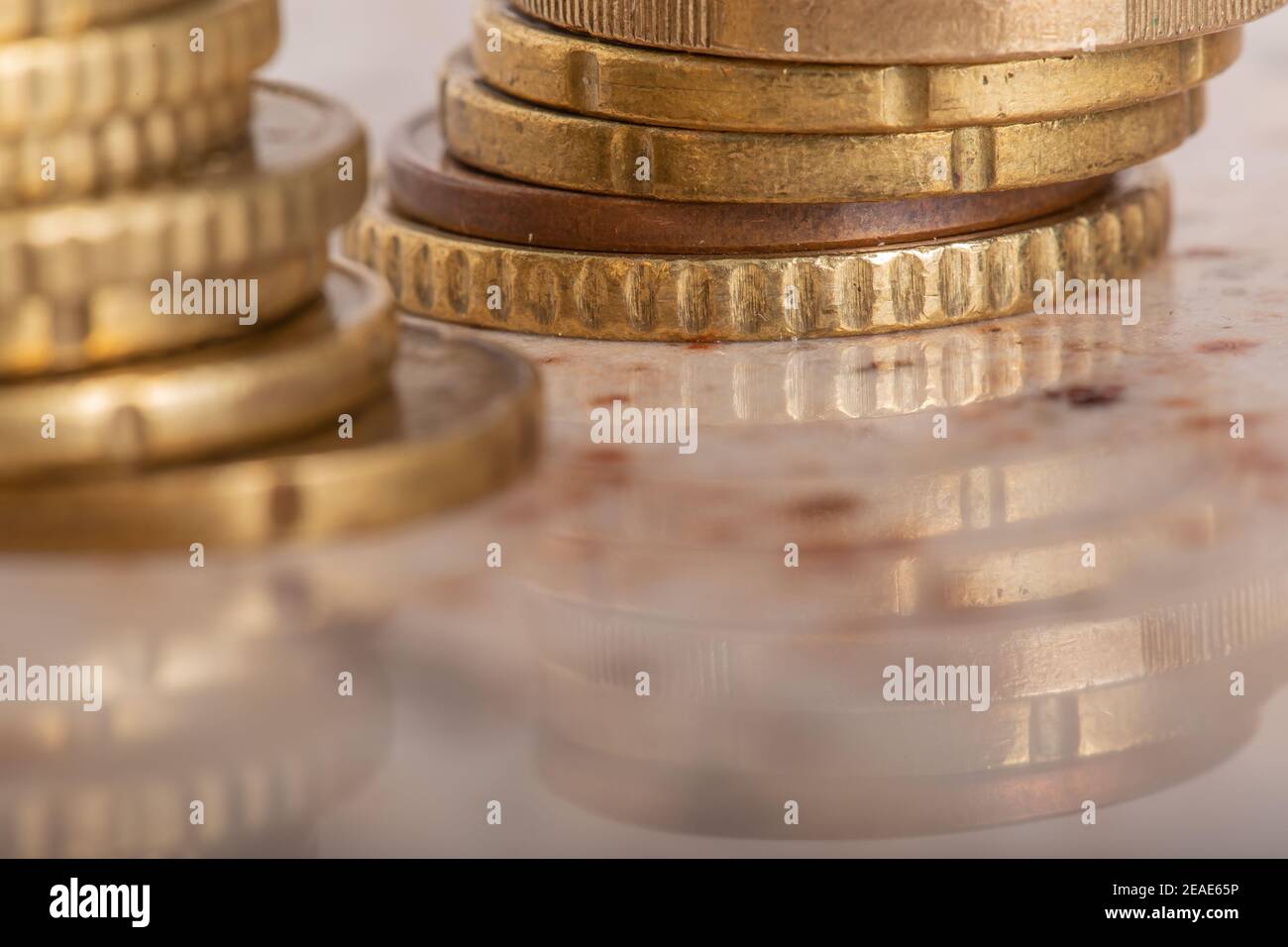 Gold coins cash money in piles, Isolated on white background Stock ...