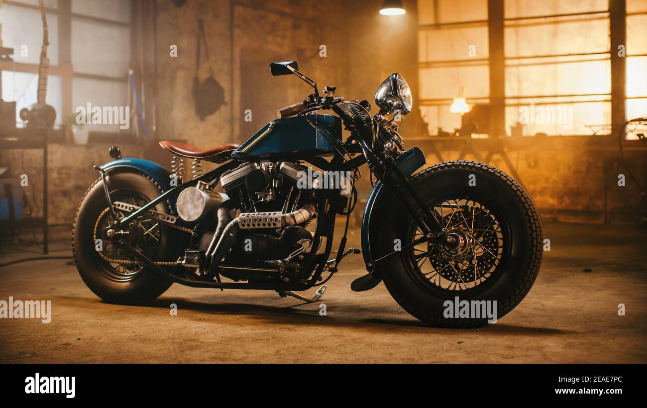 Custom Bobber Motorbike Standing in an Authentic Creative Workshop. Vintage  Style Motorcycle Under Warm Lamp Light in a Garage Stock Photo - Alamy