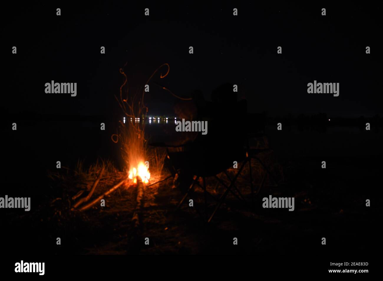 Campfire at night Stock Photo - Alamy