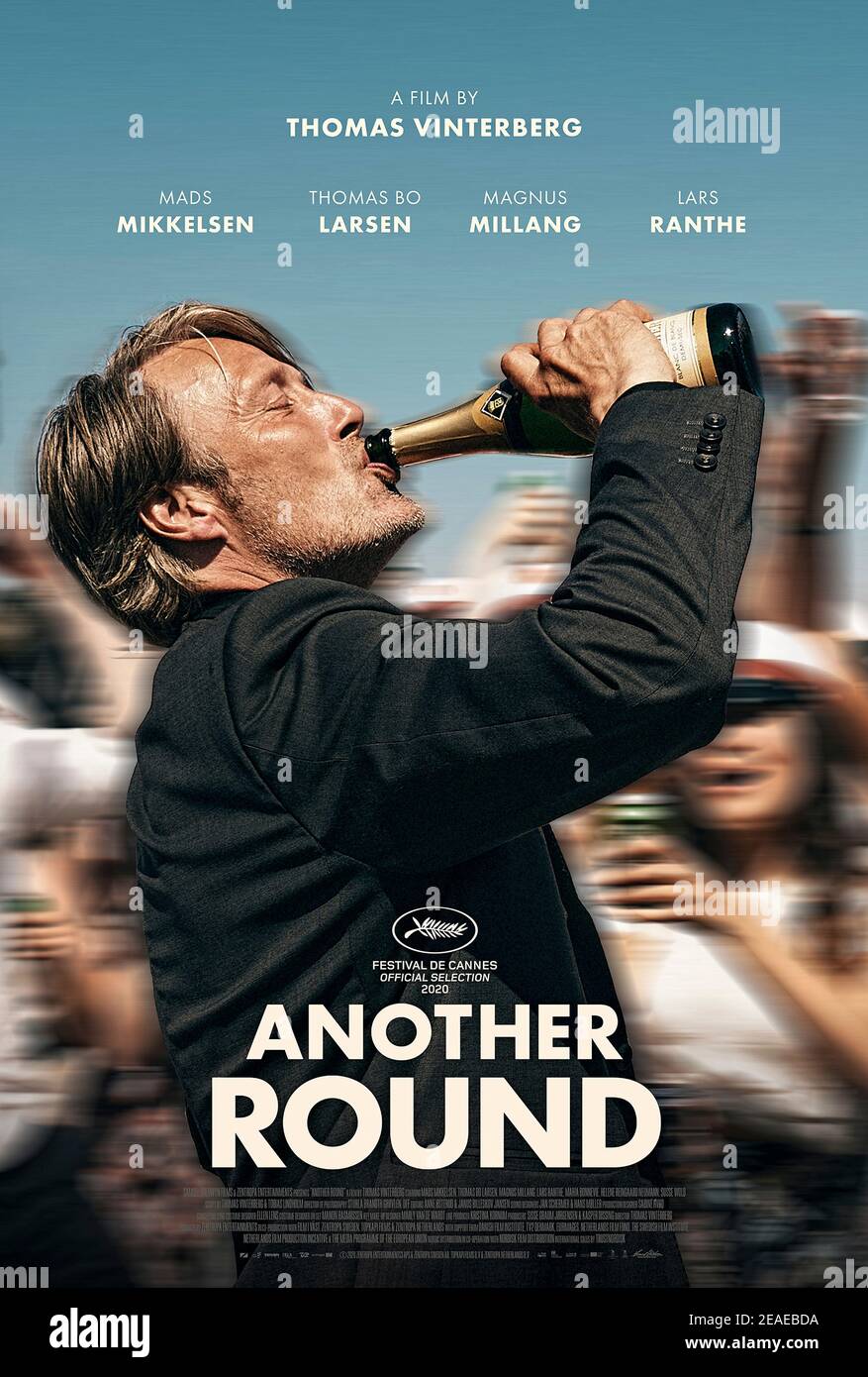 Another Round [Druk] (2020) directed by Thomas Vinterberg and starring Mads Mikkelsen, Thomas Bo Larsen and, Magnus Millang. Four teachers test a theory that they will improve their lives by maintaining a consistent level of alcohol in their blood stream. Stock Photo