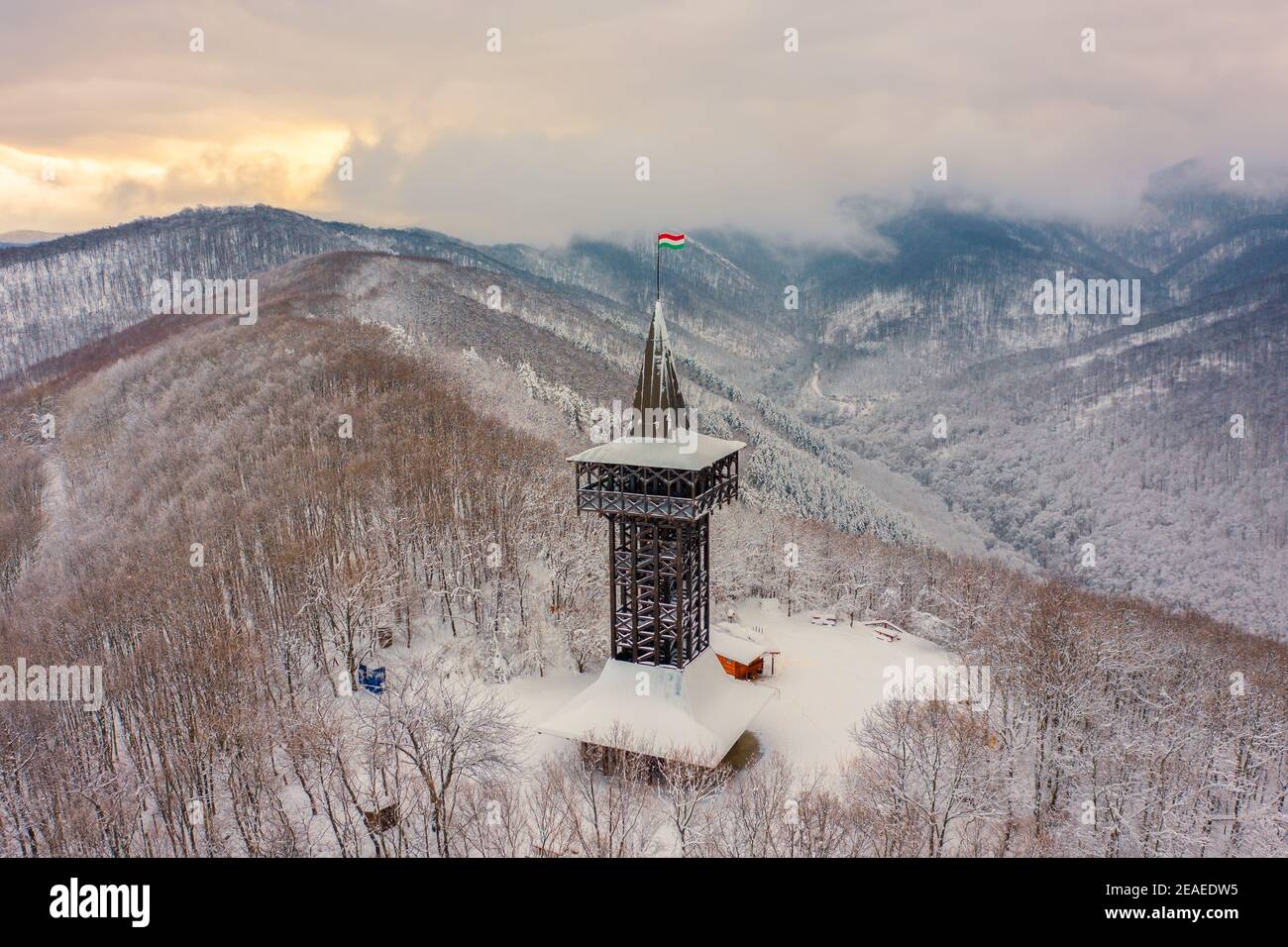 Aerial view of Millennium Lookout Tower which can be reach by foot from Szalajka-Valley near Szilvásvárad, Heves, Hungary. Winter landscape. Stock Photo