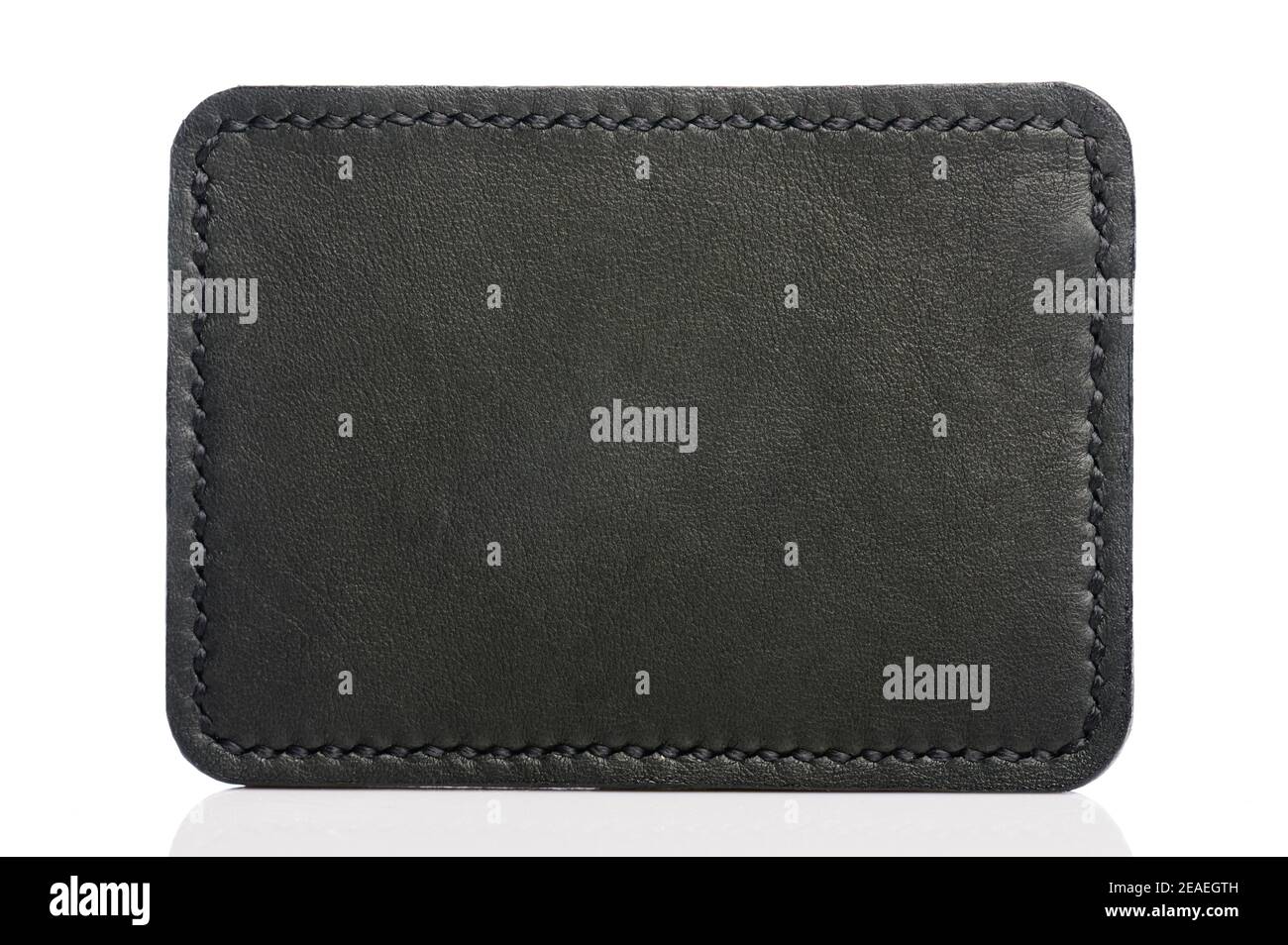 Clean black leather label tag isolated on white background Stock Photo
