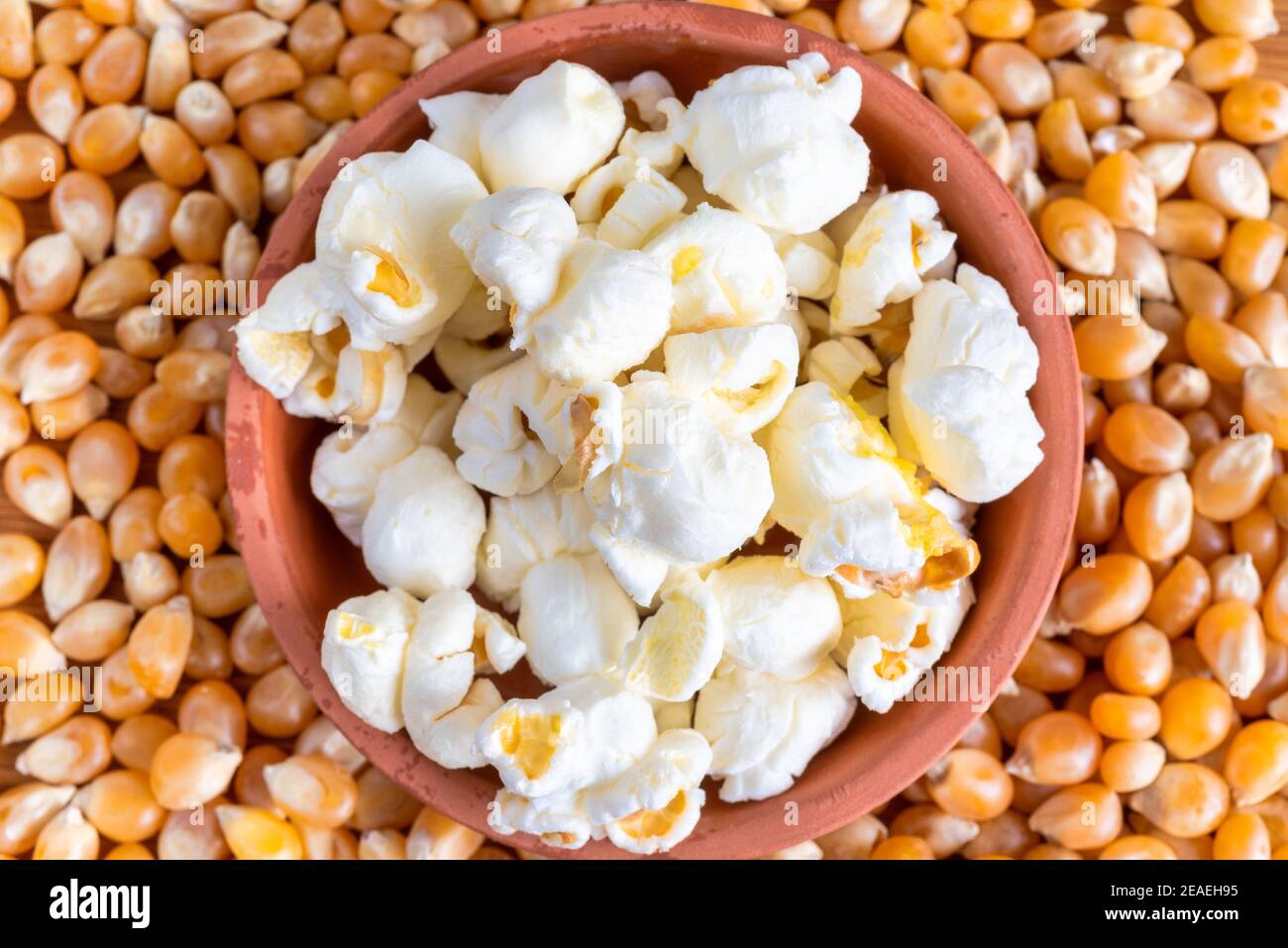 Comparison of popped and unpopped popcorn Stock Photo Alamy