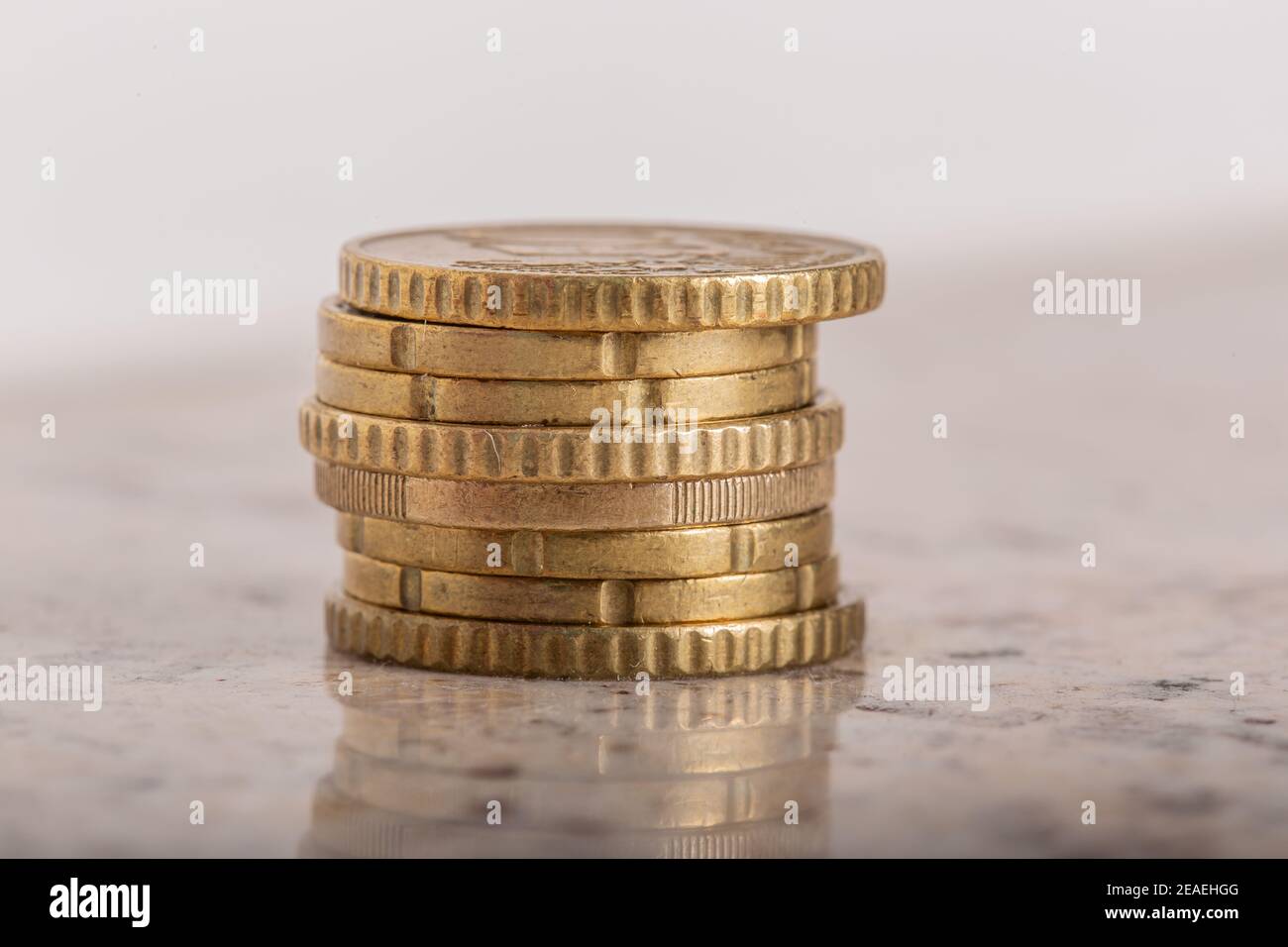 Gold coins cash money in piles, Isolated on white background Stock ...
