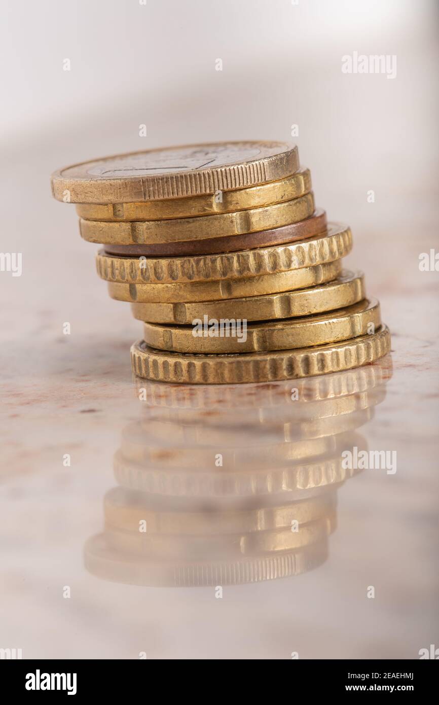 Gold coins cash money in piles, Isolated on white background Stock ...