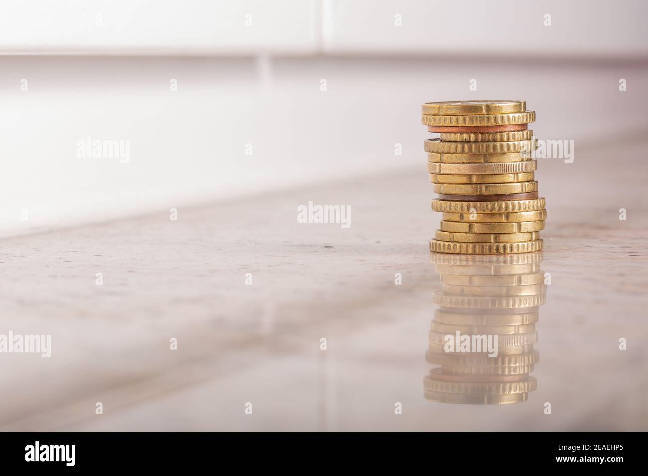 Gold coins cash money in piles, Isolated on white background Stock ...