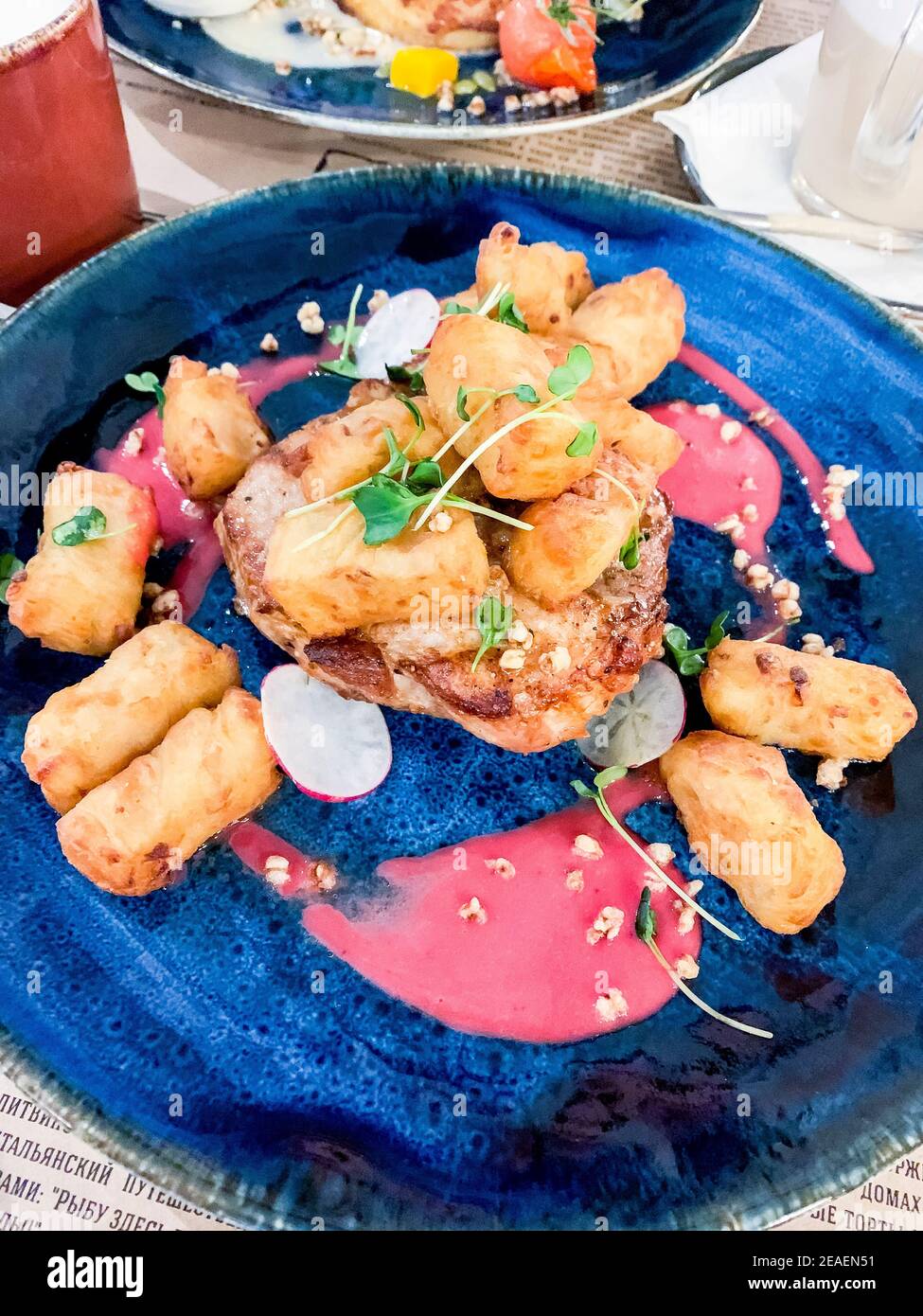 Meat steak, potato cubes, tomato sauce. Studio Photo Stock Photo Alamy