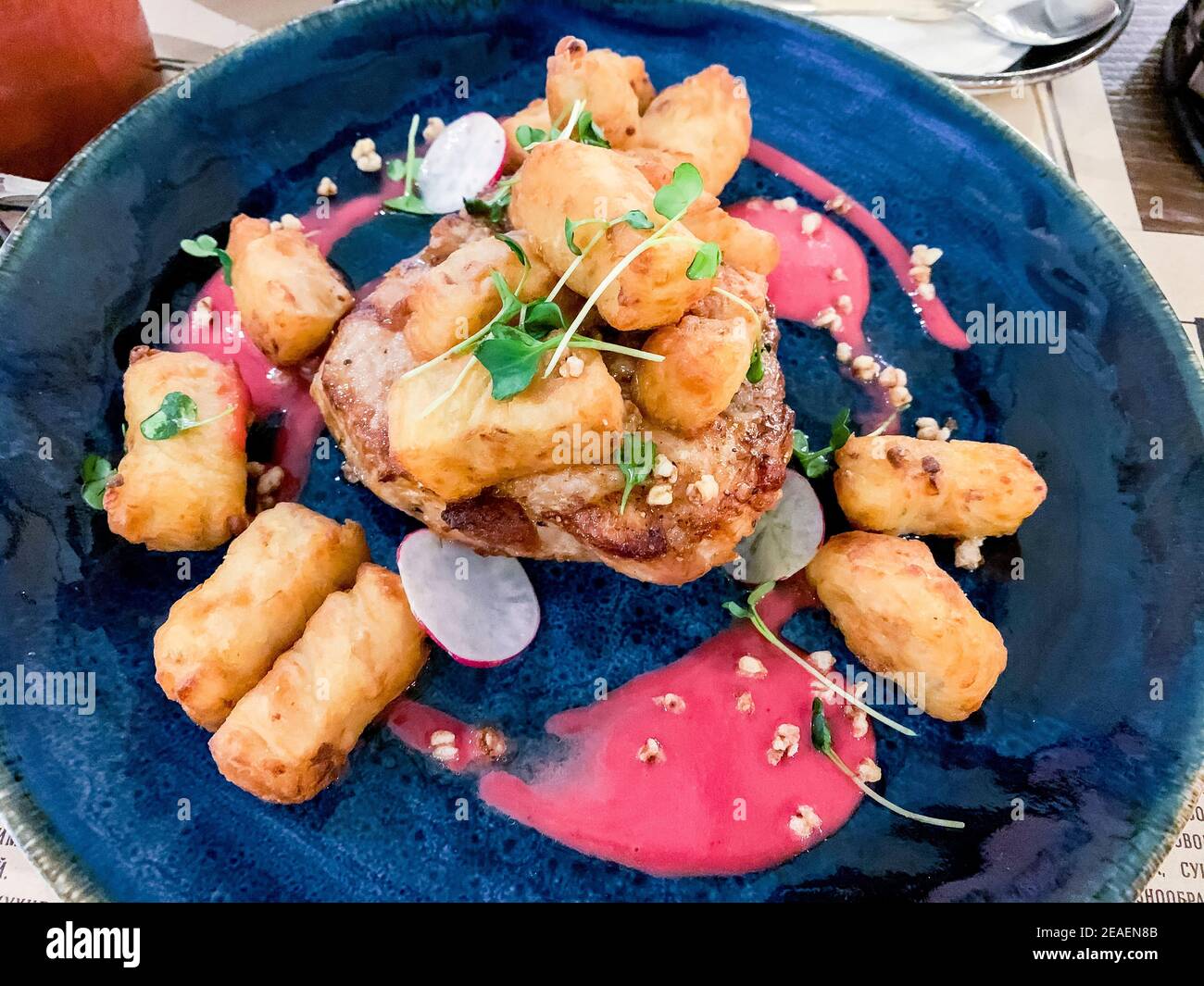Meat steak, potato cubes, tomato sauce. Studio Photo Stock Photo Alamy