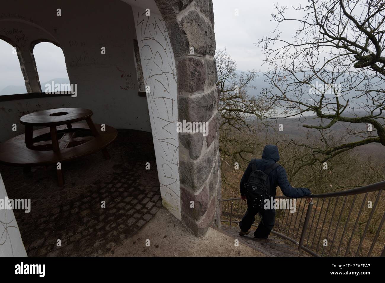 Nagymaros, Hungary - March 15, 2018:Hiker at the Julianus-kilátó (Hegyes-Julianus lookout tower in Danube bend Hungary. Near by Nagymaros city. Stock Photo