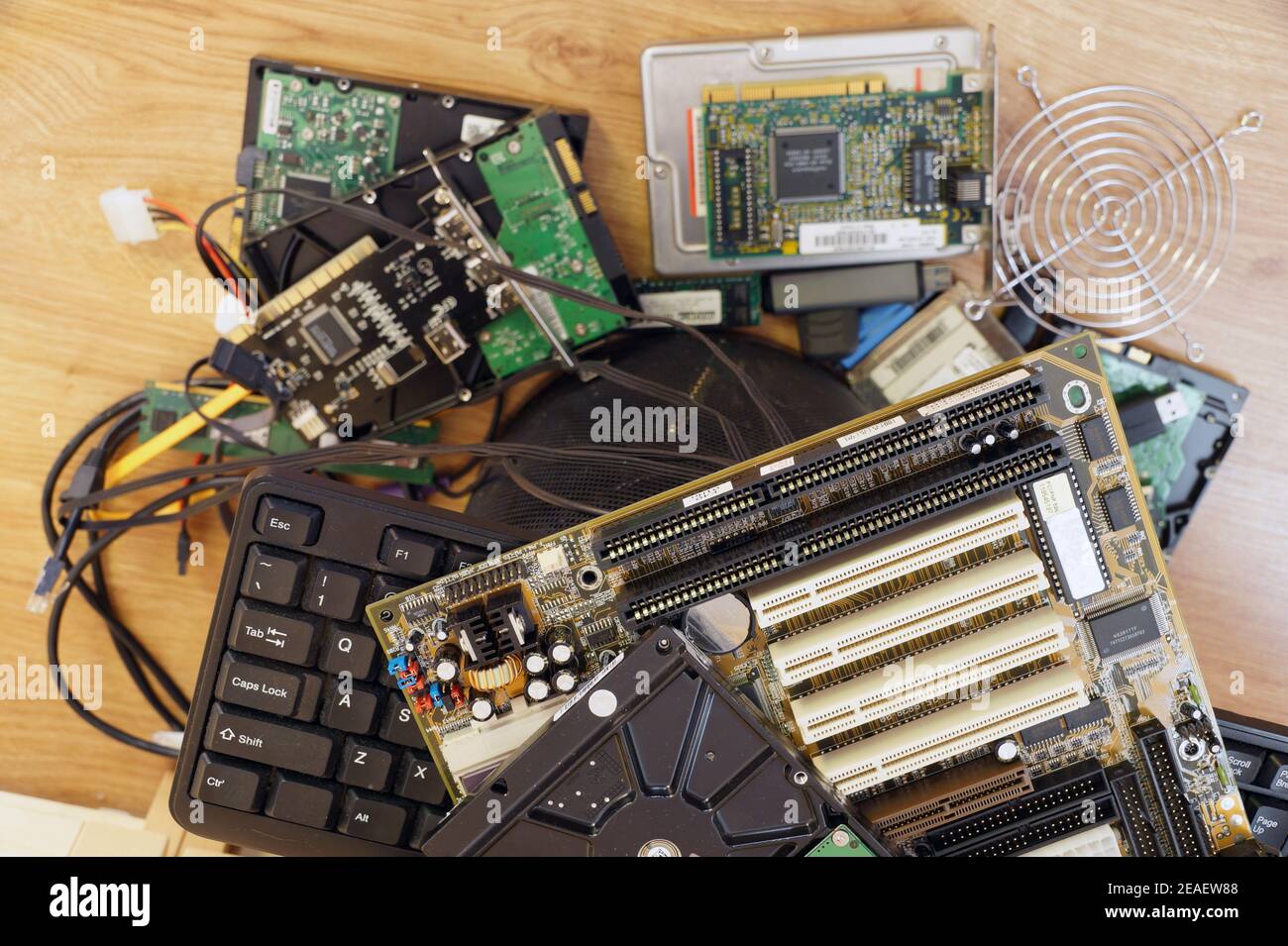 In the garbage bin: used, unnecessary, parts and computer components intended for discarding. Stock Photo