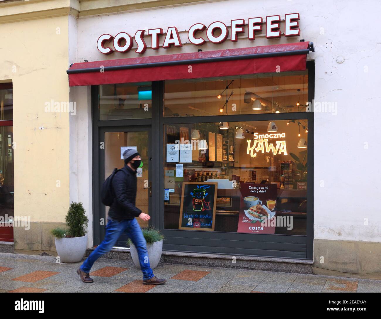Cracow. Krakow, Poland. Costa Coffee logo on the facade of its local cafe Stock Photo