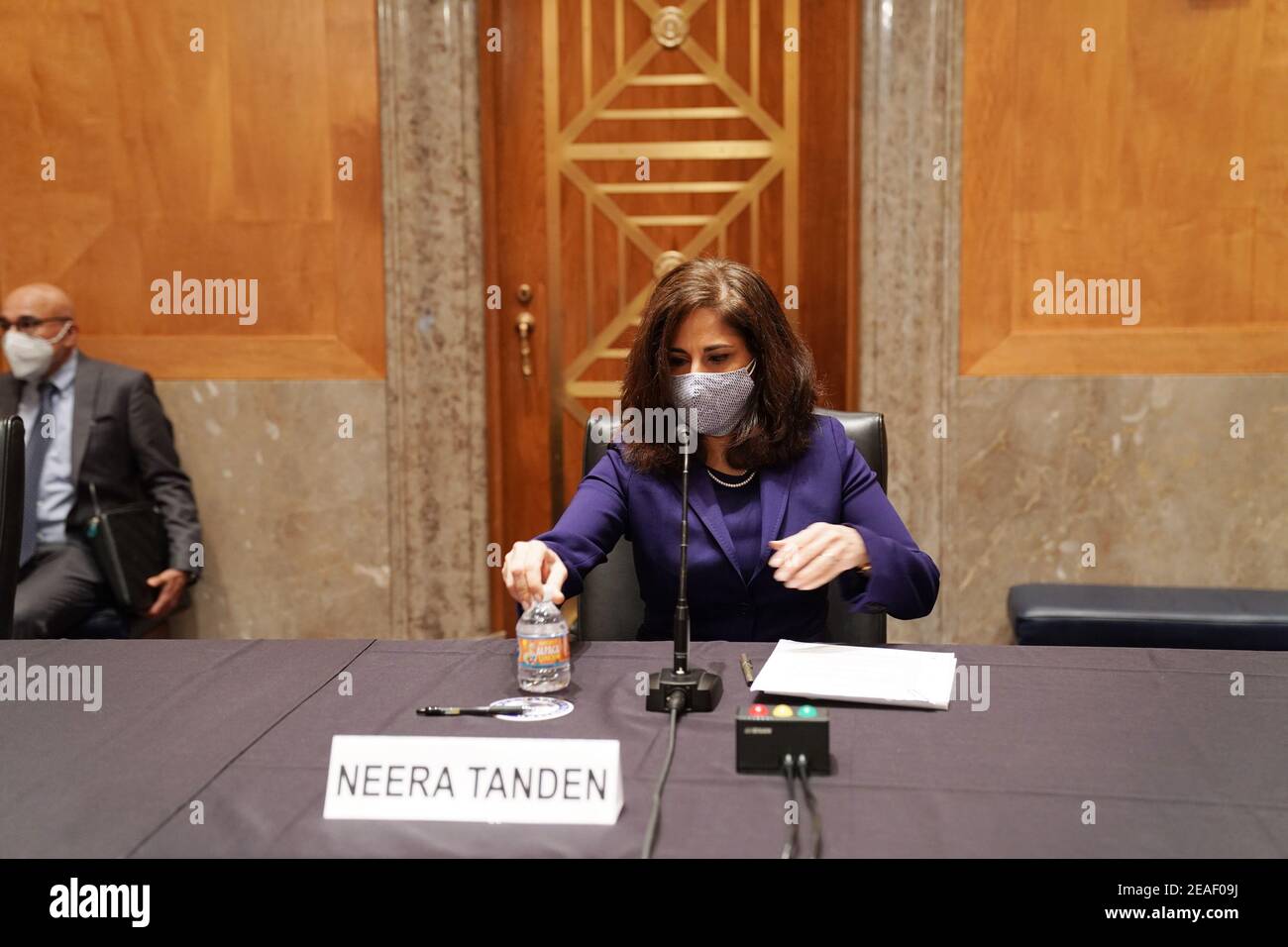 Washington DC, USA. 9th Feb 2021. Neera Tanden preparesto testify before the Senate Homeland Security and Government Affairs committee on her nomination to become the director of the Office of Management and Budget (OMB), during a hearing at the U.S. Capitol in Washington, DC on Tuesday, February 9, 2021. Tanden was nominated by President Joe Biden and is responsible for presenting the president's budget to congress. Photo by Leigh Vogel/UPI Credit: UPI/Alamy Live News Stock Photo