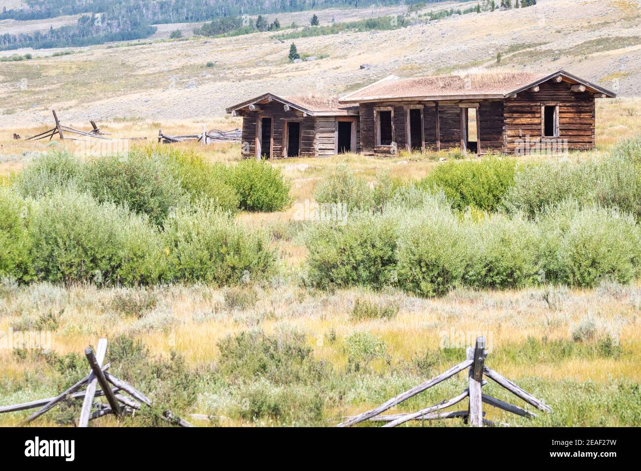 An abandoned homestead sits on the shores of the Green River in Western