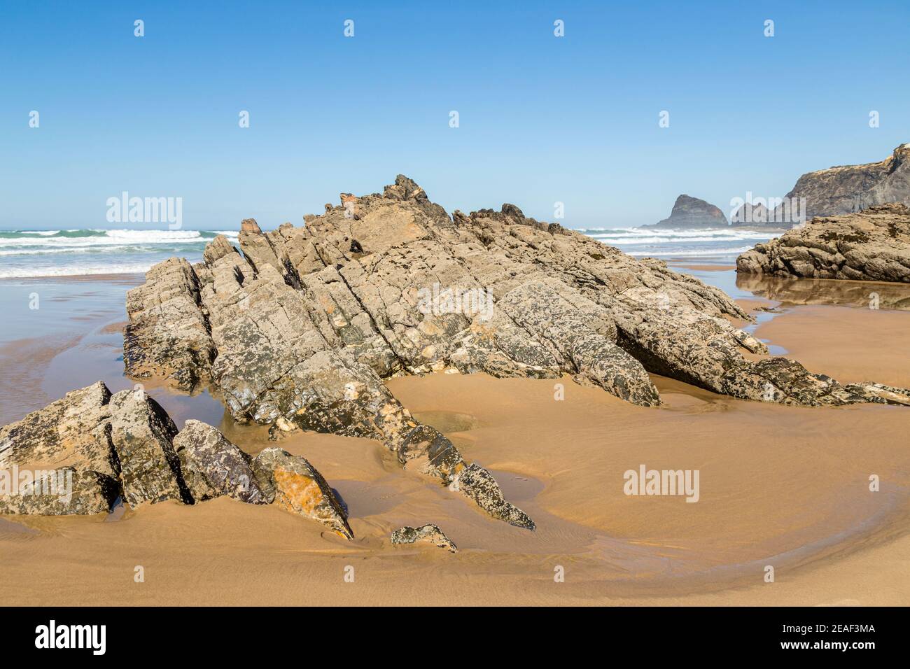 beach with rock near Odeceixe, Algarve, Portugal Stock Photo