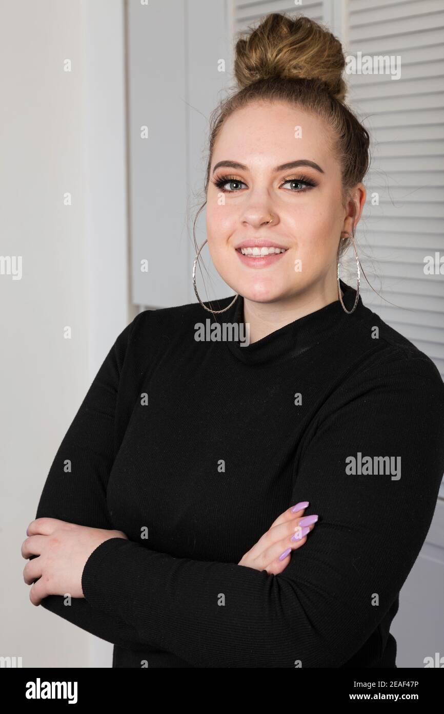 19 Year Old Pretty Woman, Smiling and Looking at Camera, USA Stock Photo