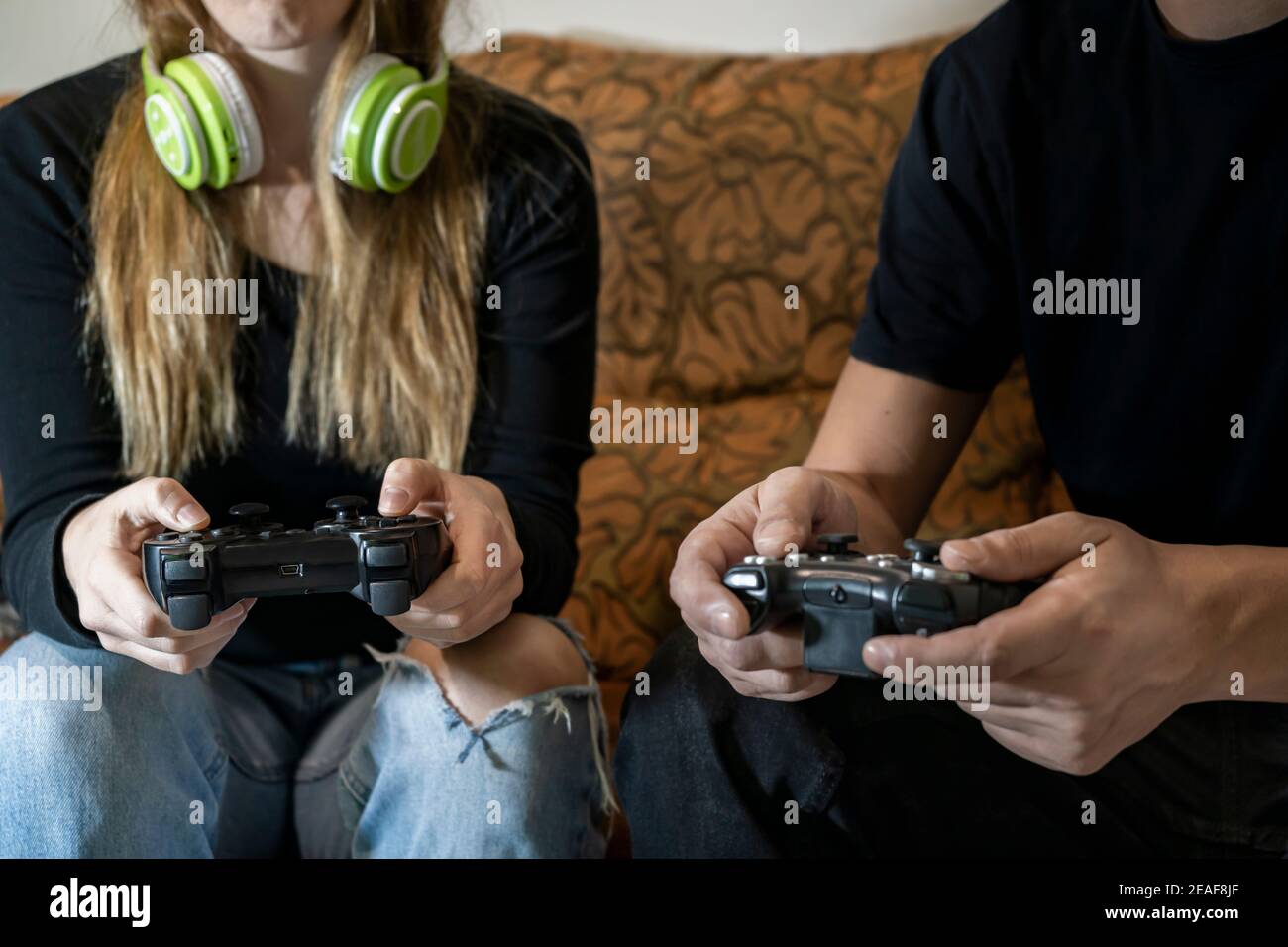 Free Photo  Boyfriend and girlfriend playing video games with controller  on console. modern couple holding joystick to play online game together,  using accessories to have fun. leisure activity