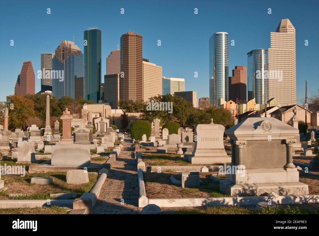 Historic cemetery in Fourth Ward area, Downtown in distance, Houston, Texas, USA Stock Photo
