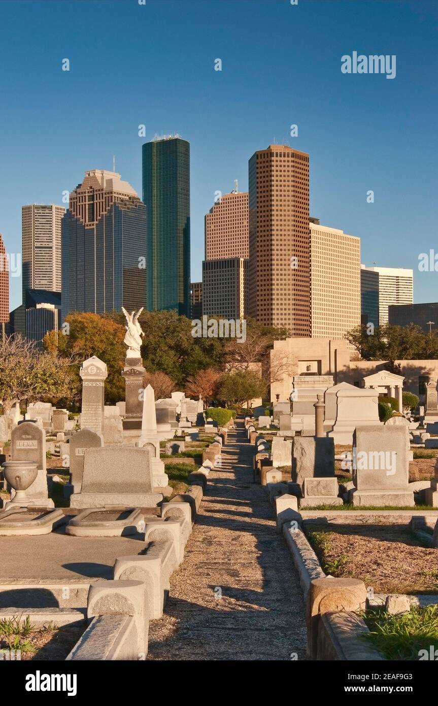 Historic cemetery in Fourth Ward area, Downtown in distance, Houston, Texas, USA Stock Photo