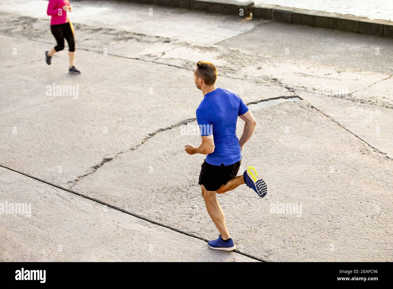 Woman running towards sun hi-res stock photography and images - Alamy