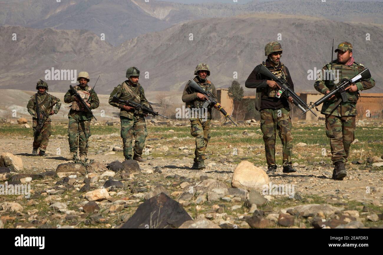 (210209) -- JALALABAD, Feb. 9, 2021 (Xinhua) -- Afghan security force members take part in a military operation against Taliban militants in Shirzad district of Nangarhar province, Afghanistan, Feb. 9, 2021. Scores of militants were killed over the past five days in eastern Nangarhar province as the Afghan security forces stepped up the crackdown on them, an army commander in the province said Tuesday. (Photo by Saifurahman Safi/Xinhua) Stock Photo