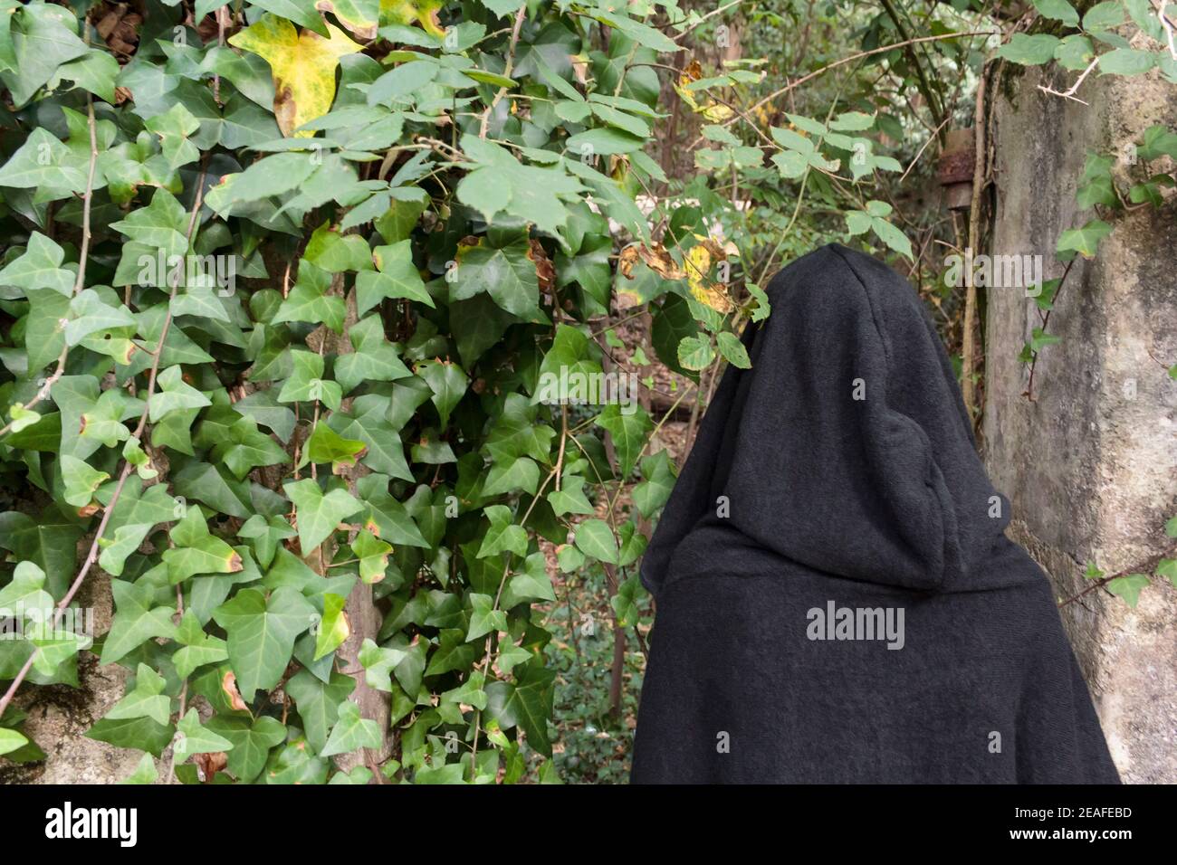 Black cloak hi-res stock photography and images - Alamy