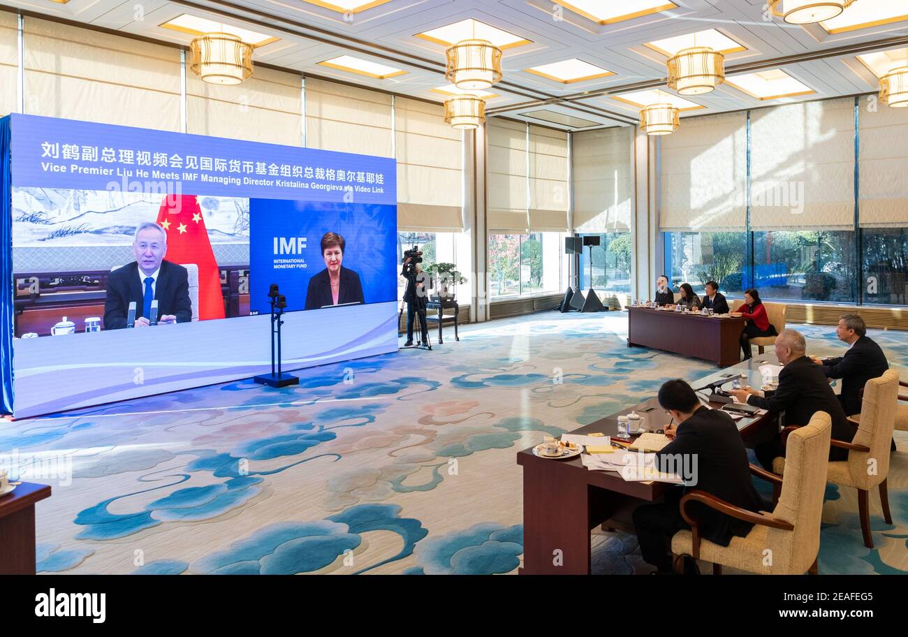 Beijing, Political Bureau of the Communist Party of China Central Committee. 9th Feb, 2021. Chinese Vice Premier Liu He, also a member of the Political Bureau of the Communist Party of China Central Committee, speaks with International Monetary Fund (IMF) Managing Director Kristalina Georgieva via video link at request on Feb. 9, 2021. They exchanged in-depth views on macroeconomics, trade, climate change financing, and support for the development of low-income countries. Credit: Zhai Jianlan/Xinhua/Alamy Live News Stock Photo