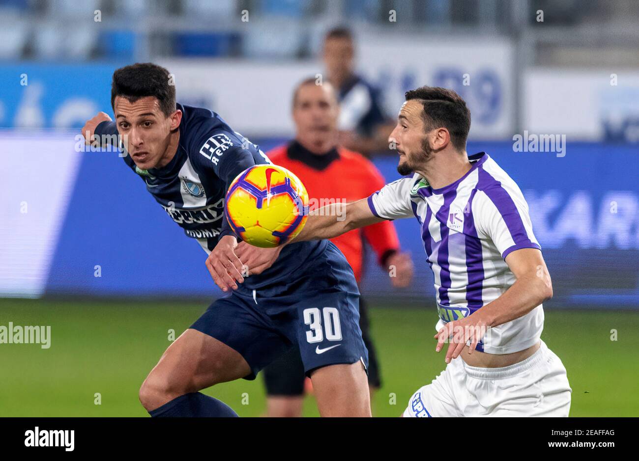 BUDAPEST, HUNGARY - FEBRUARY 15: (l-r) Miha Blazic of Ferencvarosi