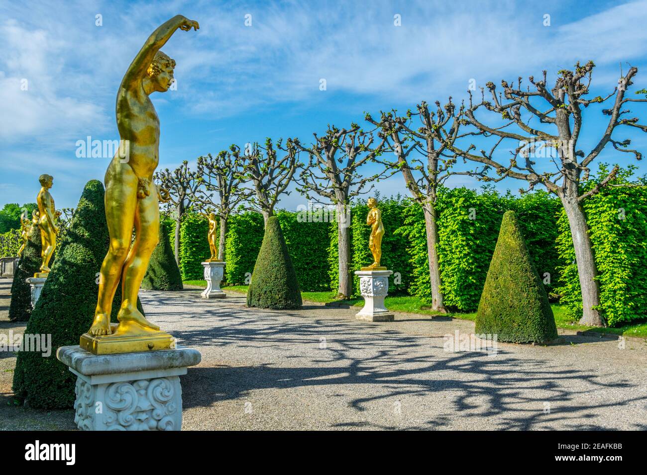 Golden statues in gardens of Herrenhausen palace in Hannover, Germany