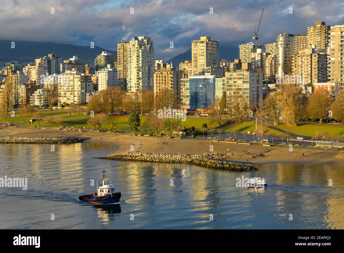 Tugboat, passenger ferry, Sunset Beach, West End condominium towers, Vancouver, British Columbia, Canada Stock Photo