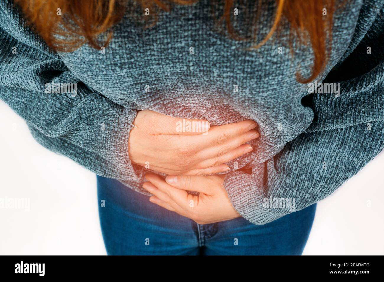 Female suffering stomach ache Stock Photo - Alamy