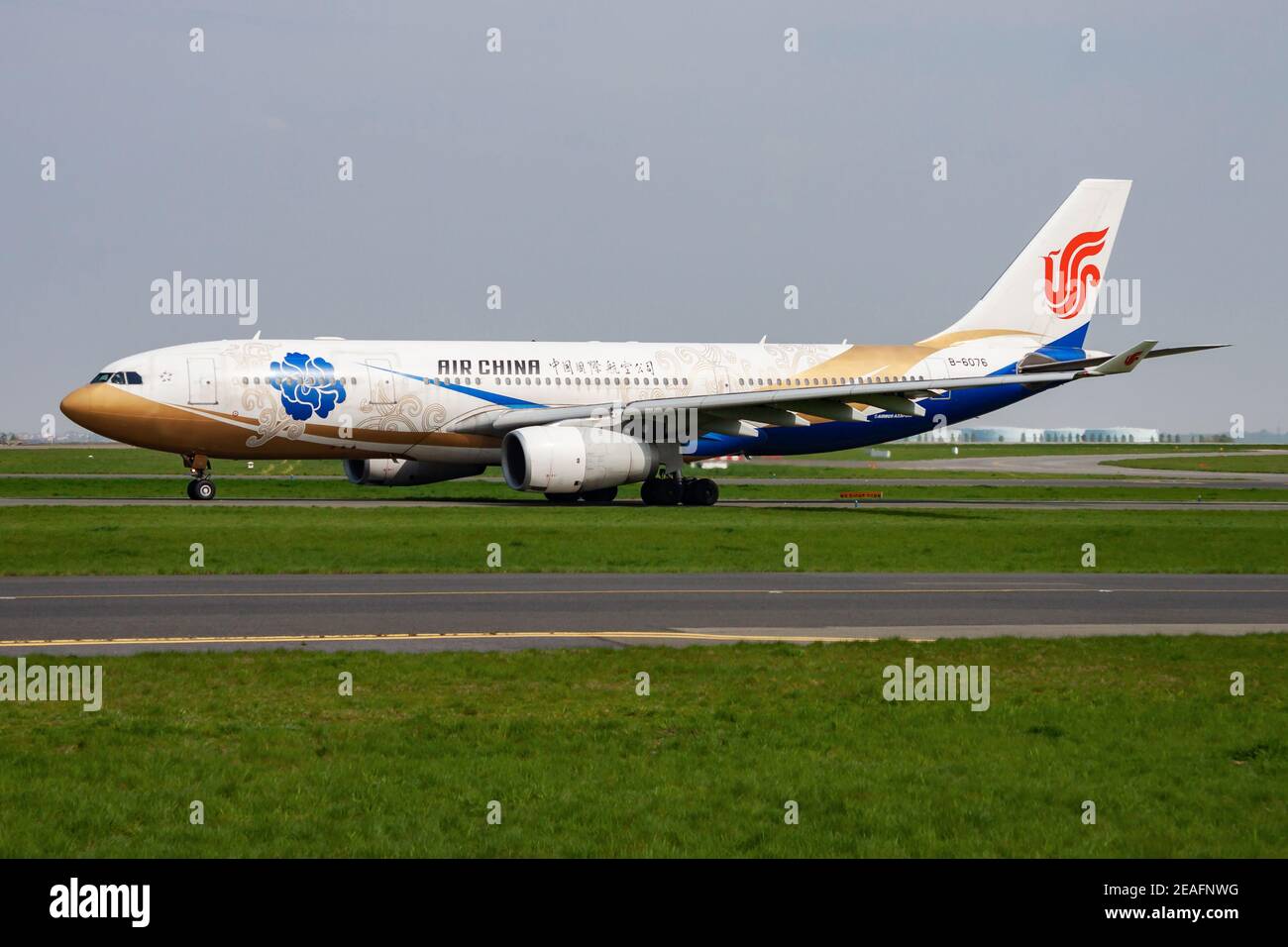 Air China special livery Airbus A330-200 B-6076 passenger plane departure and take off at Paris Charles de Gaulle Airport Stock Photo