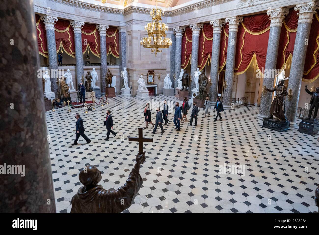 Acting House Sergeant-at-Arms Tim Blodgett, leads the Democratic House impeachment managers as they walk through Statuary Hall in the Capitol, to deliver to the Senate the article of impeachment alleging incitement of insurrection against former President Donald Trump, in Washington, DC on Tuesday, February 9, 2021. Impeachment managers will make the case that Trump was 'singularly responsible' for the January 6th attack at the U.S. Capitol and he should be convicted and barred from ever holding public office again. Photo by Ken Cedeno/UPI Stock Photo