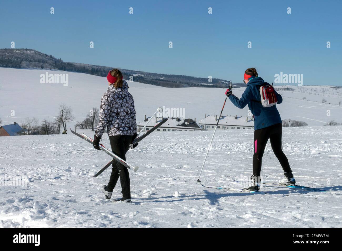 Two female skiers, cross-country skiing Czech Republic Woman skiing Stock Photo