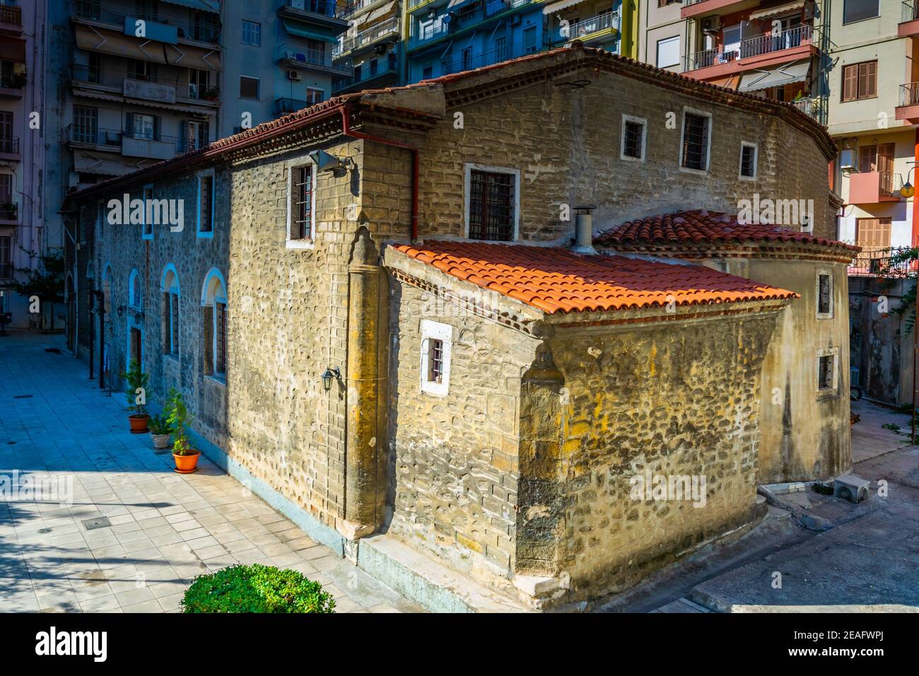 Church surrounded by buildings in Thessaloniki, Greece Stock Photo