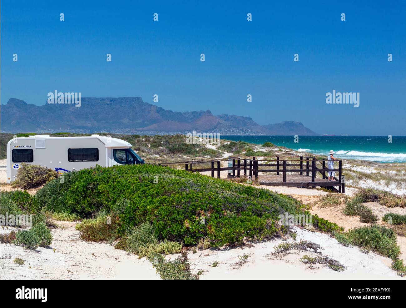 Motorhome and lady stops at the World Class Blouberg Kitesurfing Beach