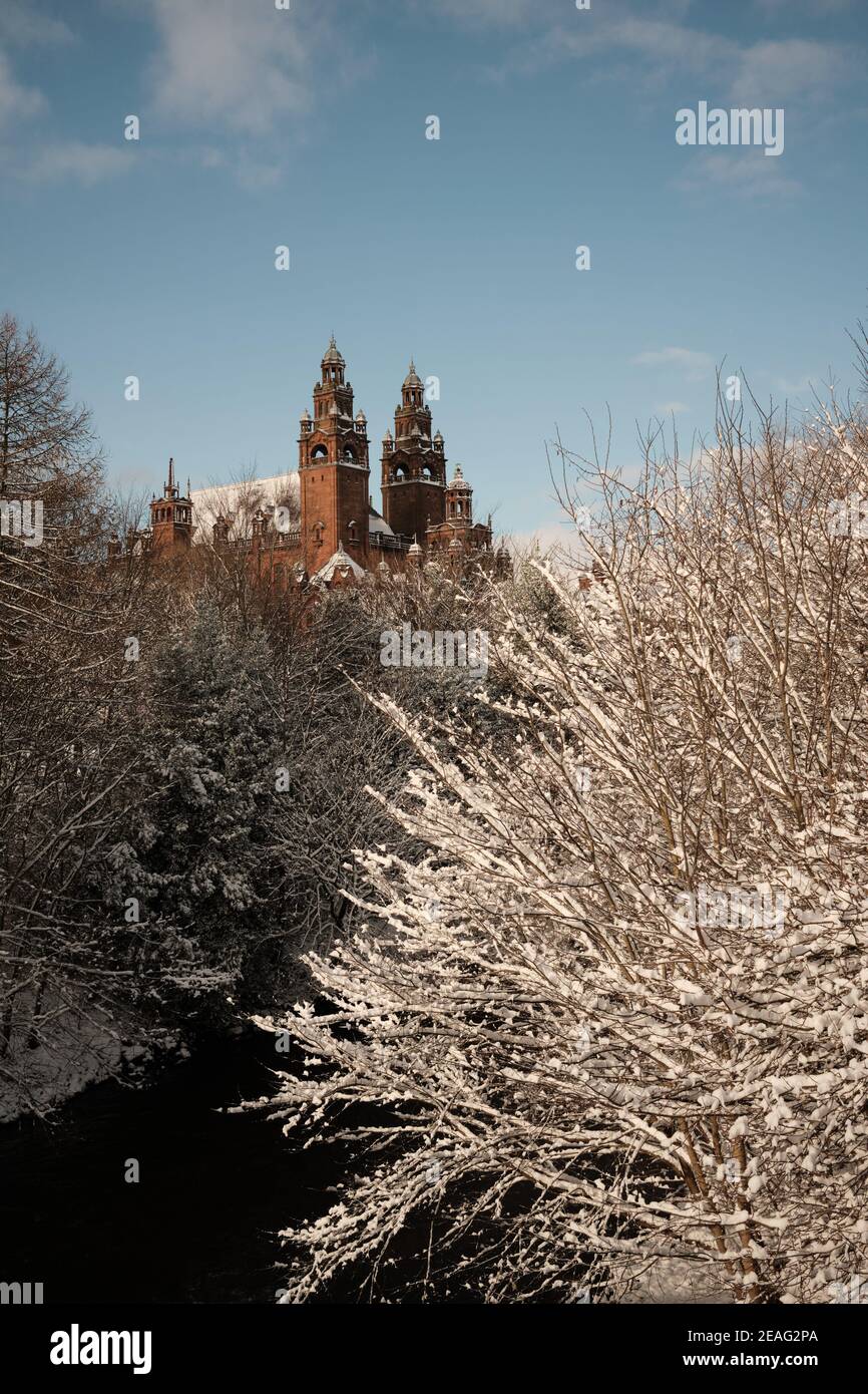Kelvingrove Art Gallery in distance from Kelvin Way at River Kelvin after heavy winter snowfall in Glasgow. February 2021. Stock Photo