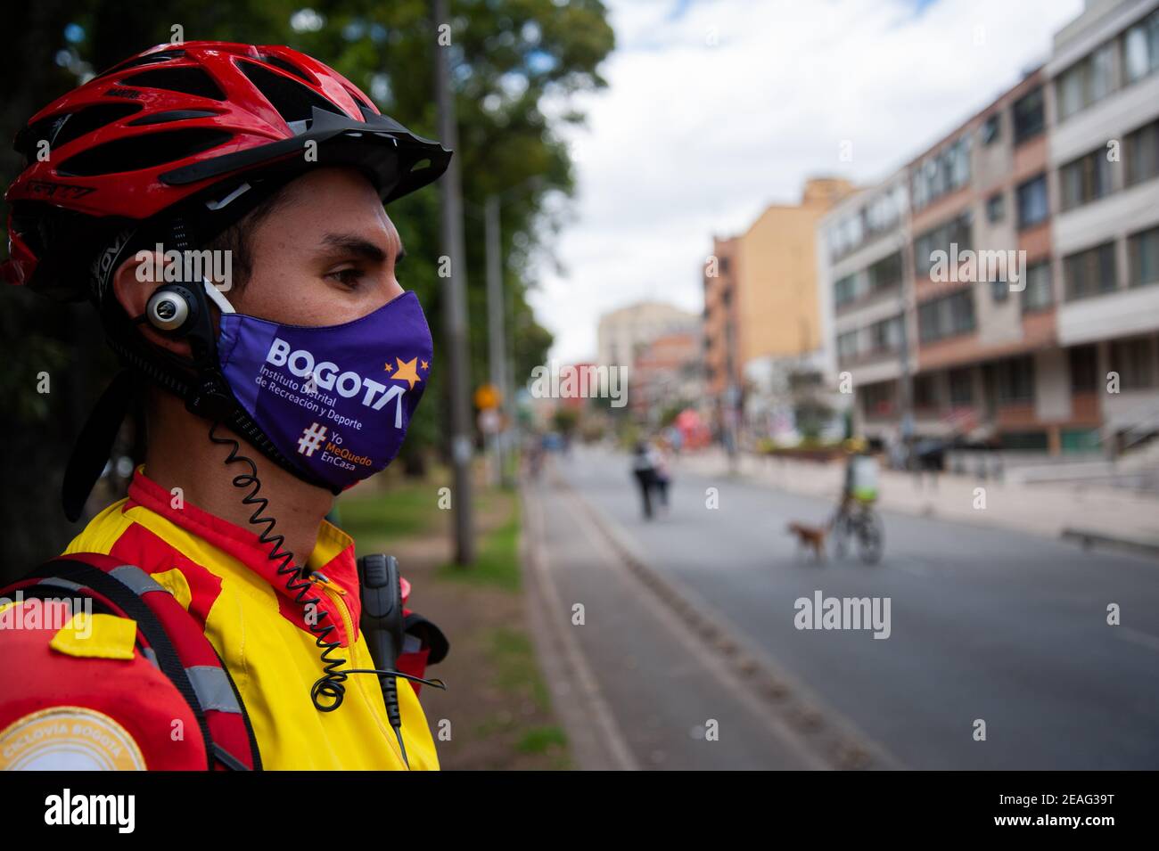 People using protective face masks enjoy a sunday of Ciclovia after its return amid the second wave of the novel Coronavirus pandemic in Colombia. In Stock Photo