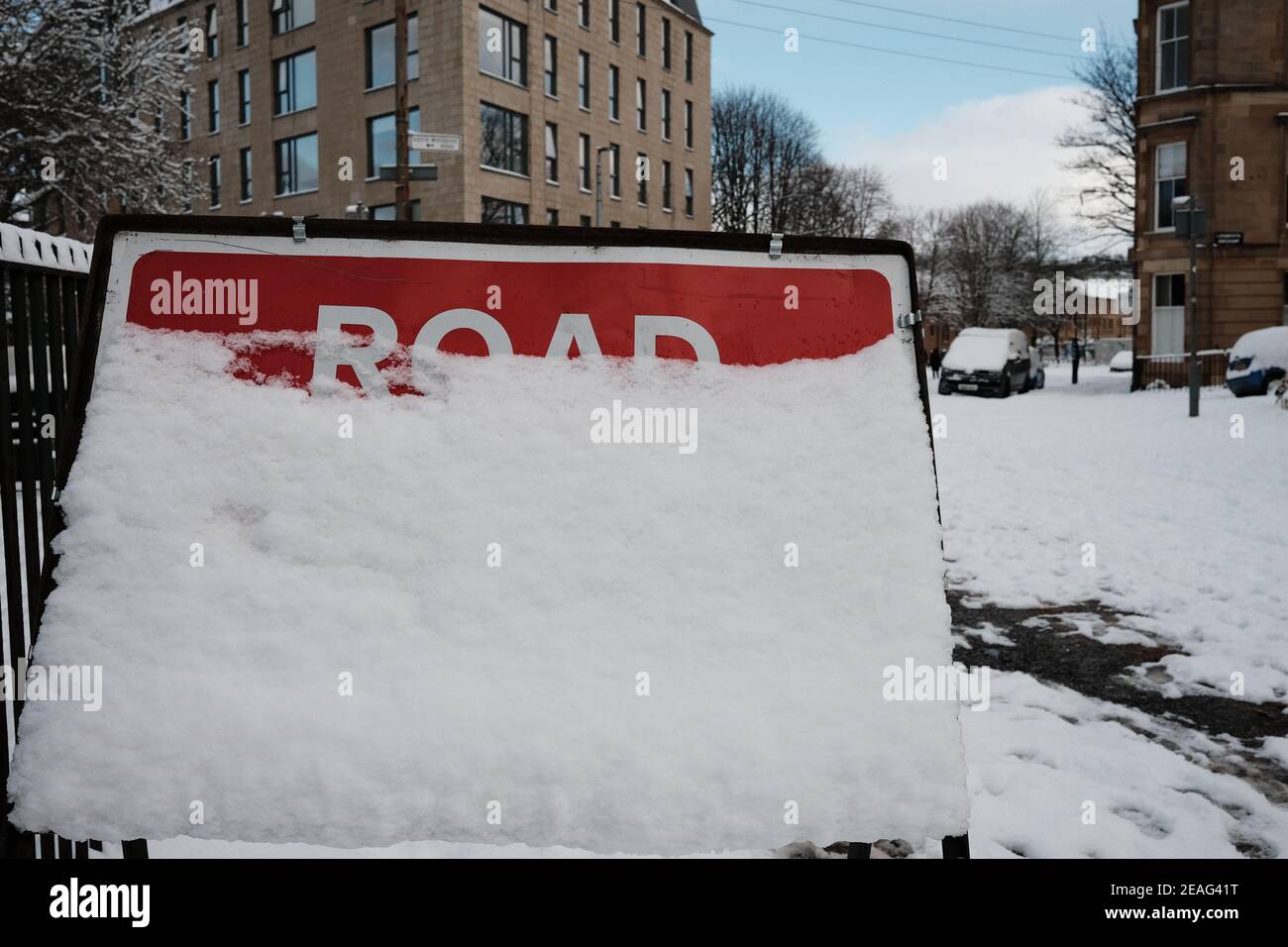 Road sign marked 'Road closed to traffic' closed due to snow, Glasgow