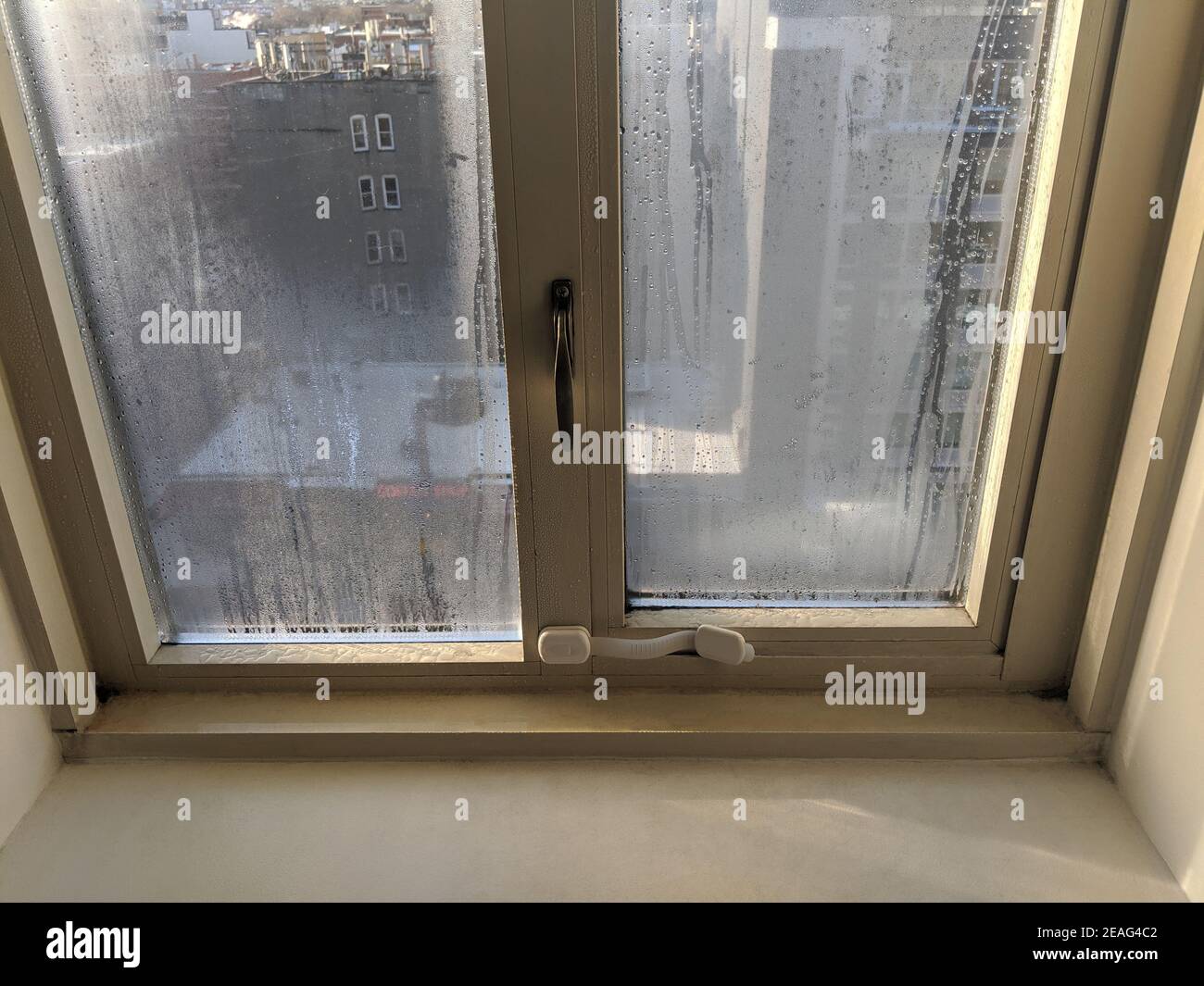 Cold room interior looking out onto water condensation formed on