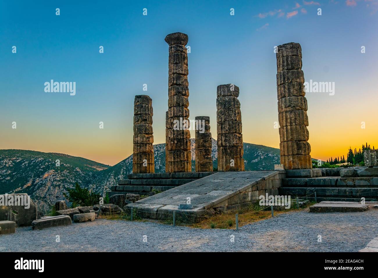 Sunset view of ruins of temple of Apollo at ancient Delphi, Greece ...