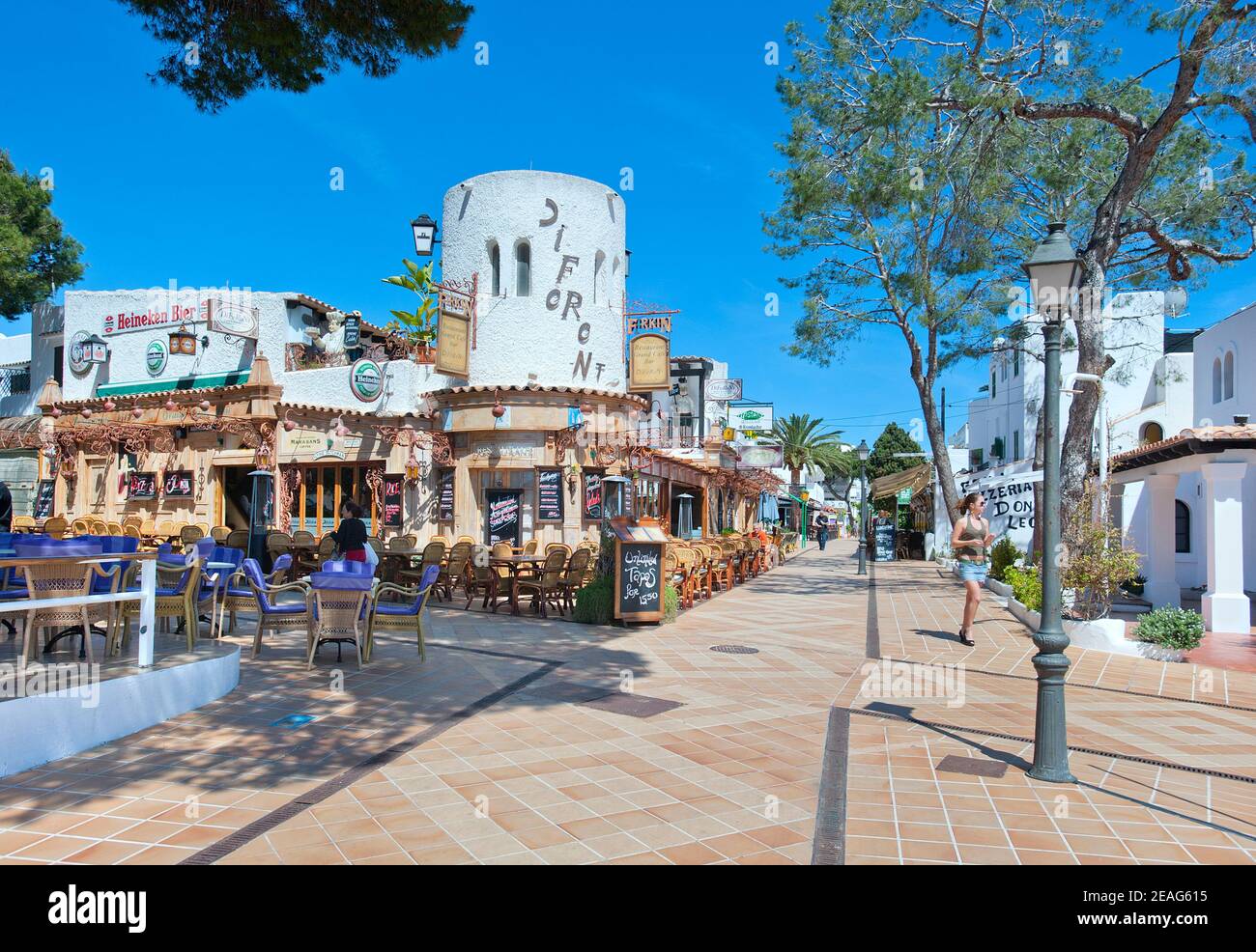 Bars and restaurants in pedestrianised town centre, Cala D'Or, Majorca, Balearics, Spain Stock Photo