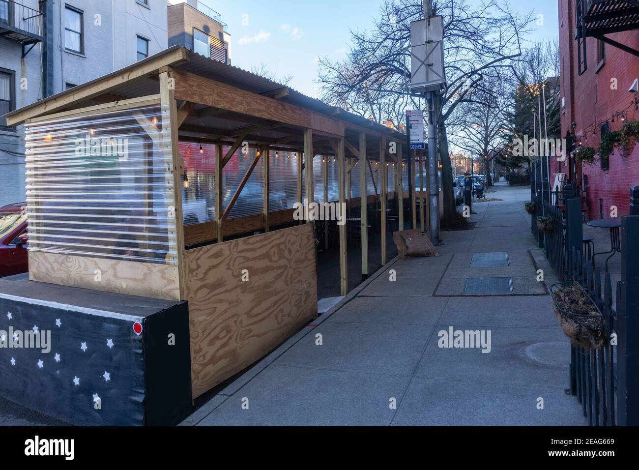 Brooklyn, USA - January 20, 2021: an empty outdoor restaurant seating during coronavirus in Berlin. Covid 19 restaurant rules. Stock Photo