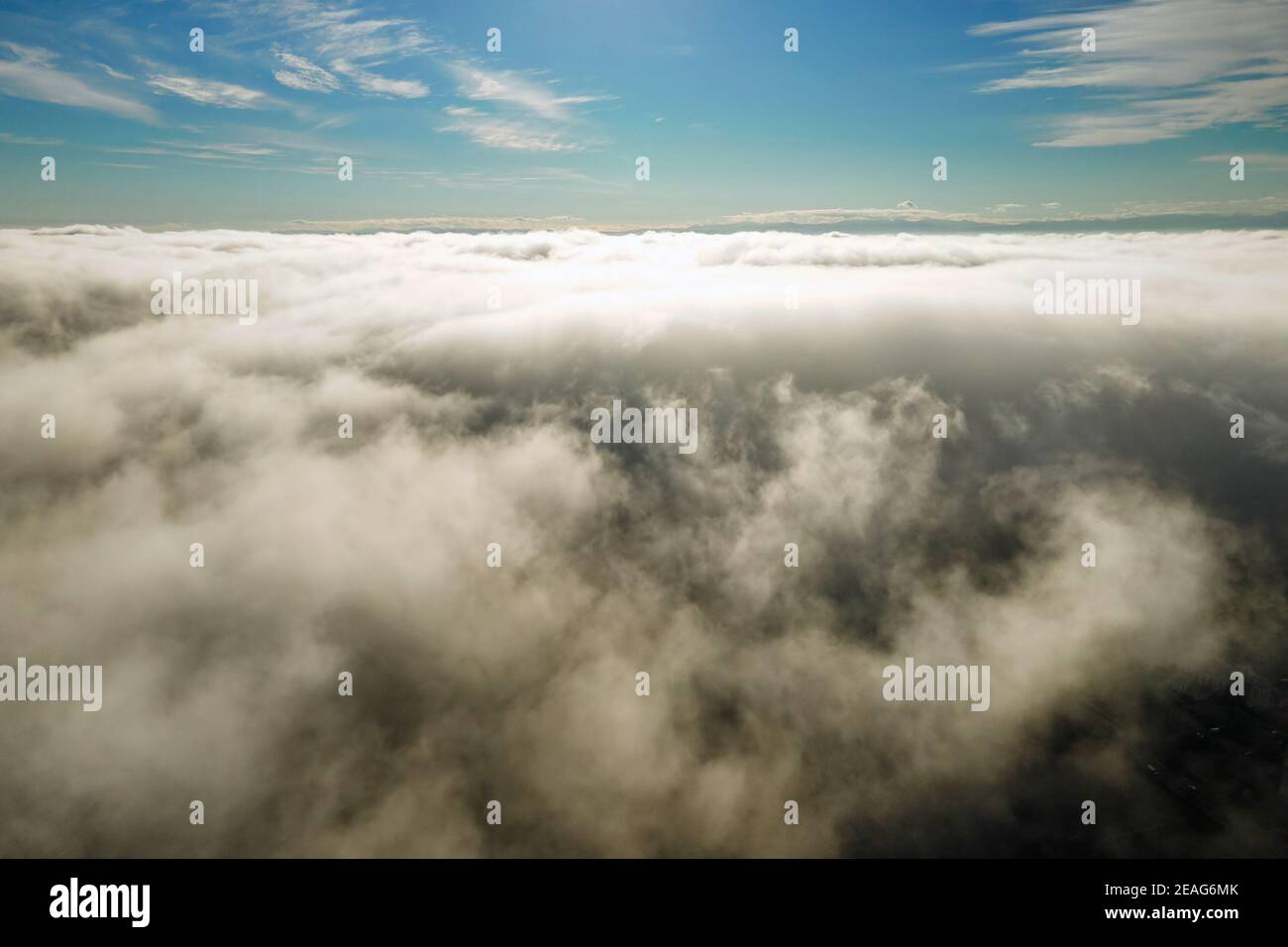 Aerial view from above of white puffy clouds in bright sunny day Stock ...