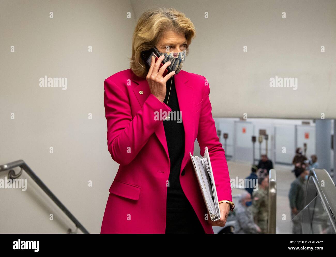 UNITED STATES - February 9: Sen. Lisa Murkowski, R-Alaska, walks through the Senate subway on the first day of former President Donald Trump's second impeachment trial at the U.S. Capitol in Washington on Tuesday, Feb. 9, 2021. Trump is charged with “incitement of insurrection” after his supporters stormed the Capitol in an attempt to overturn November's election result. Credit: Caroline Brehman/Pool via CNP | usage worldwide Stock Photo