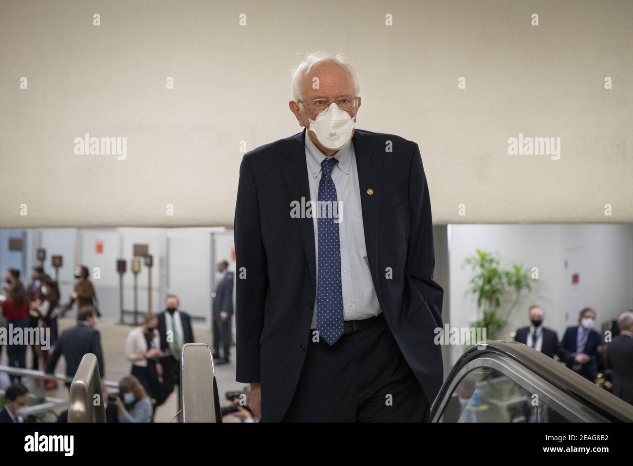 Washington, United States. 09th Feb, 2021. Sen. Bernie Sanders, I-Vt., walks through the Senate subway on the first day of former President Donald Trump's second impeachment trial at the U.S. Capitol in Washington on Tuesday, February 9, 2021. Trump is charged with 'incitement of insurrection' after his supporters stormed the Capitol in an attempt to overturn November's election result. Photo by Caroline Brehman/UPI Credit: UPI/Alamy Live News Stock Photo