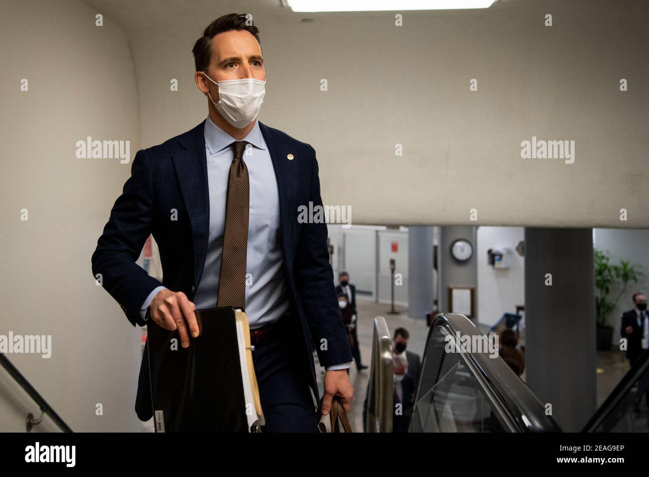 United States. 9th Feb, 2021. Sen. Josh Hawley, R-Mo., walks through the Senate subway on the first day of former President Donald Trump's second impeachment trial at the U.S. Capitol in Washington on Tuesday, Feb. 9, 2021. Trump is charged with “incitement of insurrection” after his supporters stormed the Capitol in an attempt to overturn November's election result. Credit: Caroline Brehman/Pool Via Cnp/Media Punch/Alamy Live News Stock Photo
