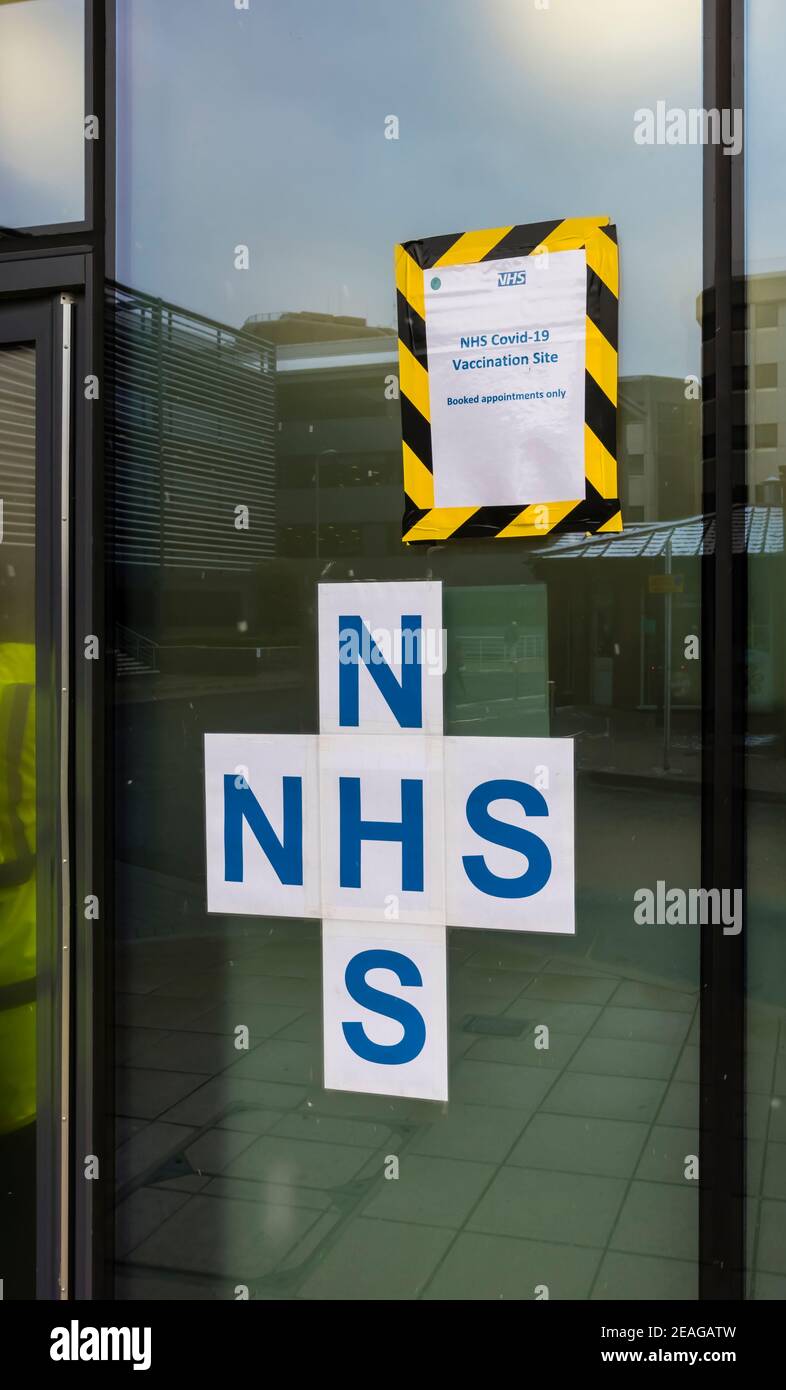 Entrance to the NHS Covid-19 vaccination site in Victoria Gate, Chobham Road, Woking, Surrey, south-east England Stock Photo