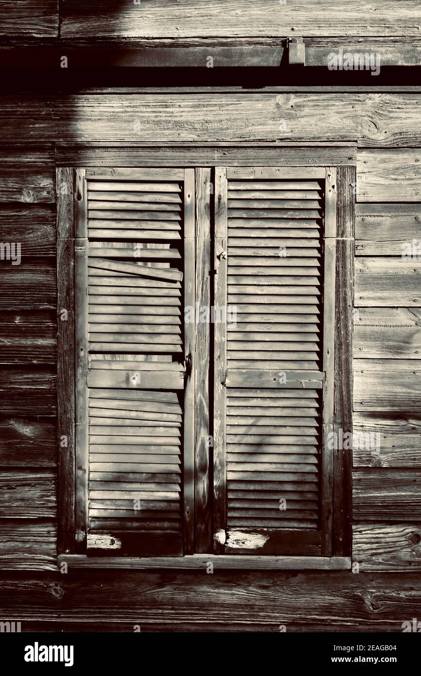 Old weather shutters in Key West, Florida, FL USA.  Southern most point in the continental USA.  Island vacation destination for relaxed tourism. Stock Photo